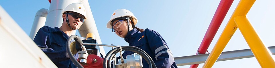 Two engineers working on volve